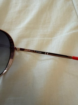 Gafas de sol mujer Guess doradas