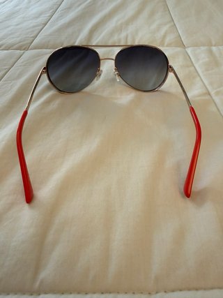 Gafas de sol mujer Guess doradas