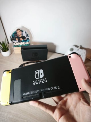 Nintendo Switch Rosa y Amarillo + Mando