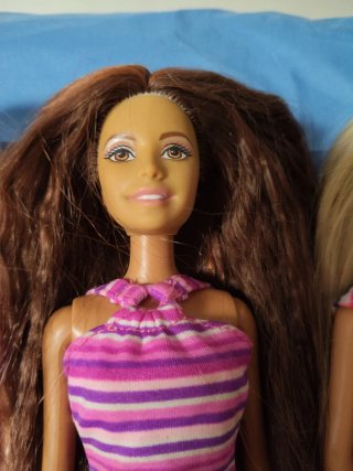 Lote 4 Barbie anni '90. In condizioni accettabili.