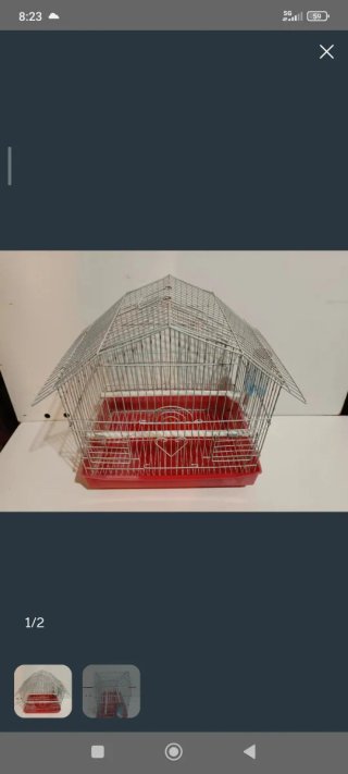 Jaula para pájaros plateada y roja