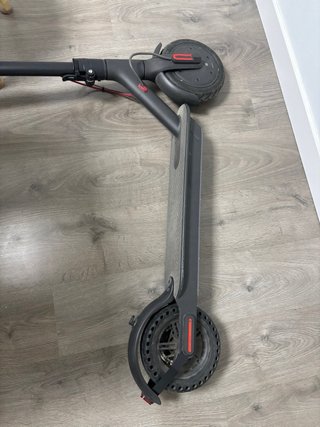 Patinete Xiaomi M365 con su caja