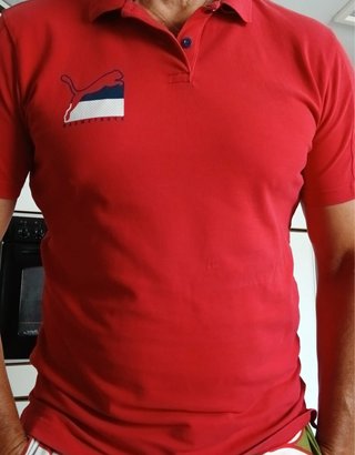 Camisa Polo Puma Roja talle M , pero le va a un L