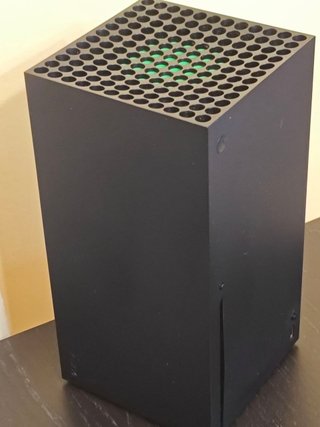 Xbox Series X 1TB + Mando y Carga y Juega