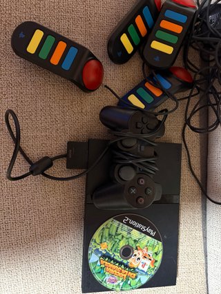 Consola PS2 con mando y juego