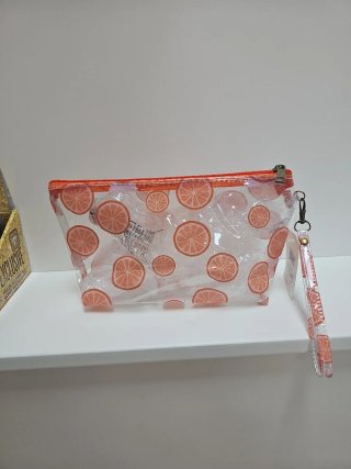 Neceser transparente con estampado frutal