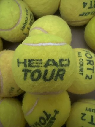 50 Pelotas de Tenis seminuevas.
