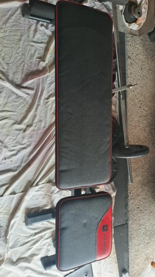Set de pesas y barra de gimnasio