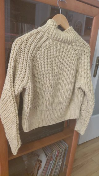 Jersey de punto cuello alto beige