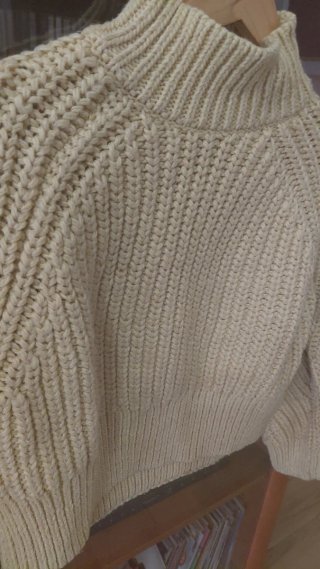 Jersey de punto cuello alto beige