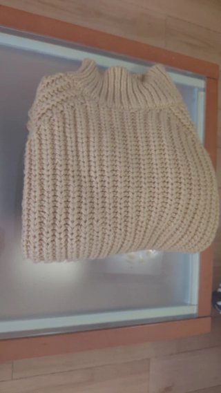 Jersey de punto cuello alto beige