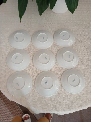 9 Platitos de Porcelana Blanca de Castro.