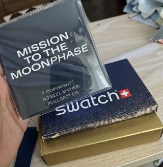 Swatch Omega Nero con scatola