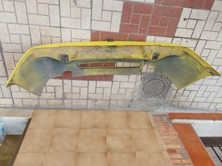 Paragolpes Trasero Ford Escort Amarillo año 1992