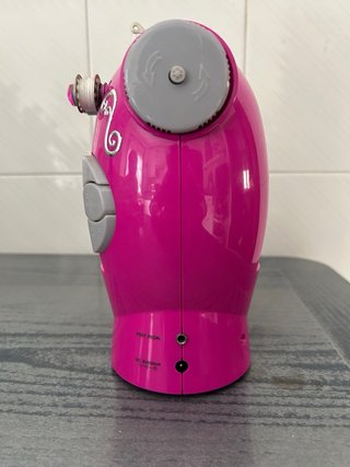 Máquina de coser infantil rosa