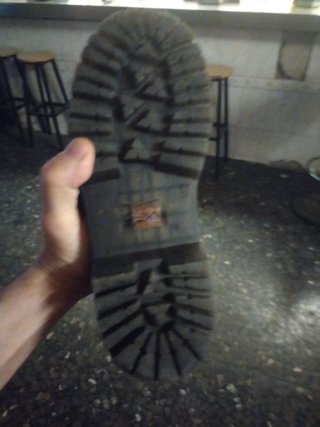Botas negras con cordones y cremallera