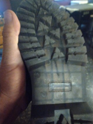 Botas negras con cordones y cremallera