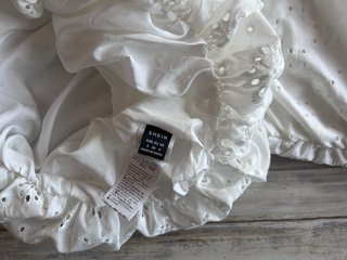 Vestido blanco strapless con bordados talla S