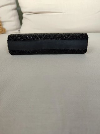 Bolso de mano negro John Lewis con pedrería
