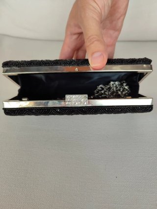 Bolso de mano negro John Lewis con pedrería