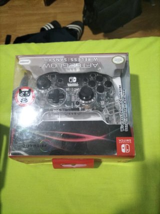 Nintendo Switch + Mando Afterglow