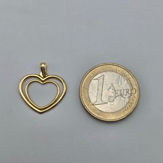 Colgante de oro de 18k. Corazón. Peso: 0.62 gr.