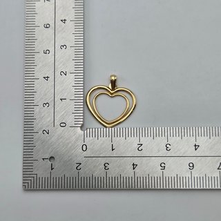 Colgante de oro de 18k. Corazón. Peso: 0.62 gr.
