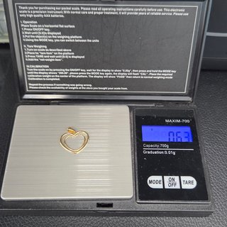 Colgante de oro de 18k. Corazón. Peso: 0.62 gr.
