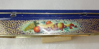 Caja de hojalata estilo Art Decó con frutas
