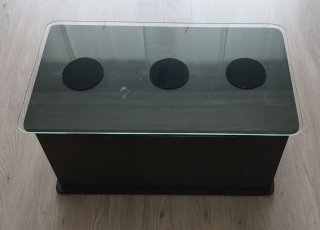 Baúl / Mesa centro para salon con base de cristal