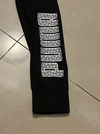 Conjunto deportivo Puma negro y blanco