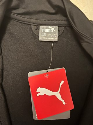 Conjunto deportivo Puma negro y blanco