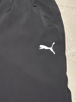 Conjunto deportivo Puma negro y blanco