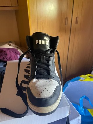 Deportivas Puma altas negras y blancas