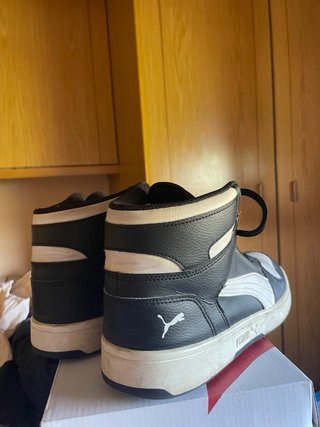 Deportivas Puma altas negras y blancas