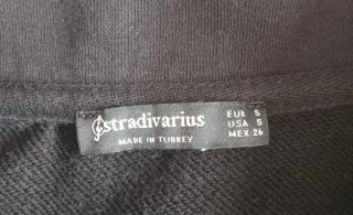 Sudadera negra con cremallera