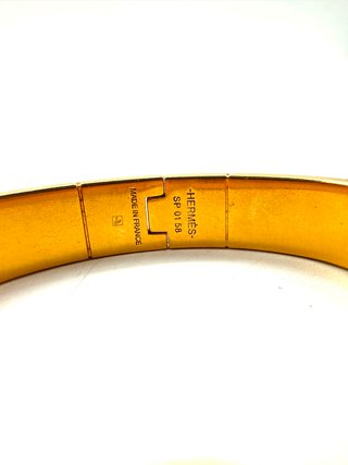 Brazalete Hermès Dorado y Rojo