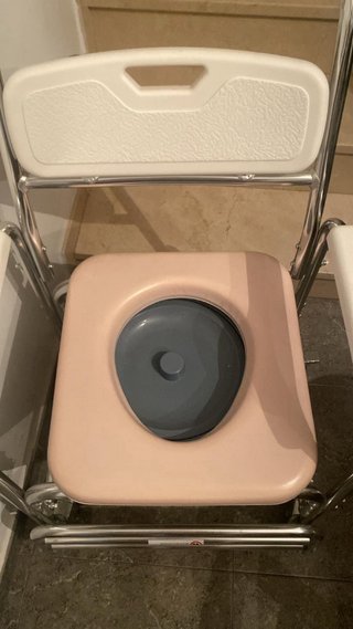 Silla de ducha con ruedas