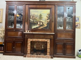 Mueble librería clásico con chimenea