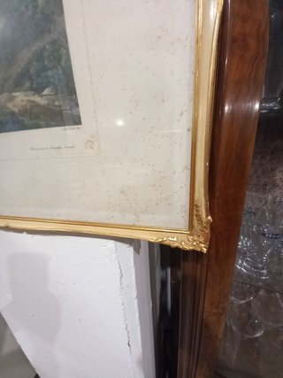 Quadro con cornice dorata
