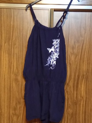 Mono corto azul con mariposas