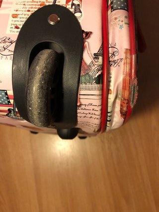 Maleta rosa con dibujo y ruedas