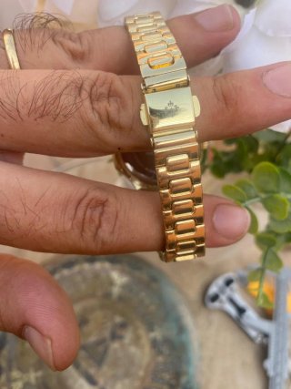 Reloj Patek  Dorado con Bisel