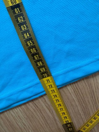 Camiseta deportiva Puma azul y blanca