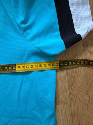 Camiseta deportiva Puma azul y blanca