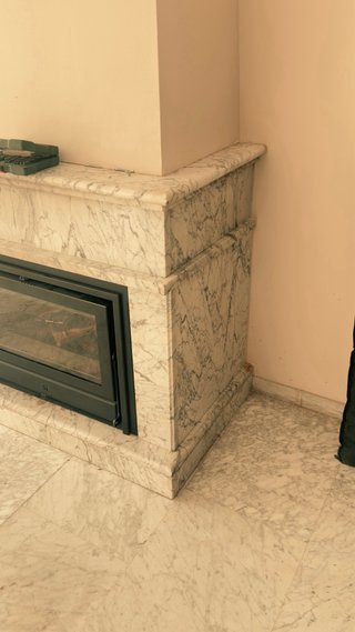 Casete de chimenea con ventilador en mármol