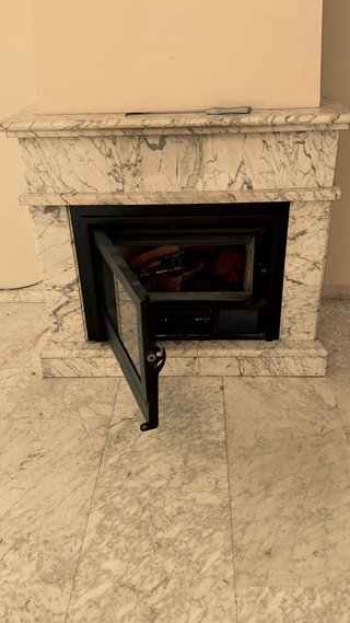Casete de chimenea con ventilador en mármol