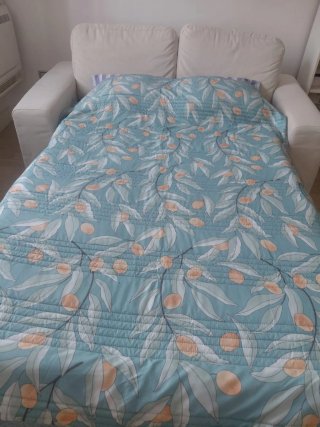 Divano letto in tessuto e pelle