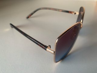 Gafas de sol Mango doradas y moradas