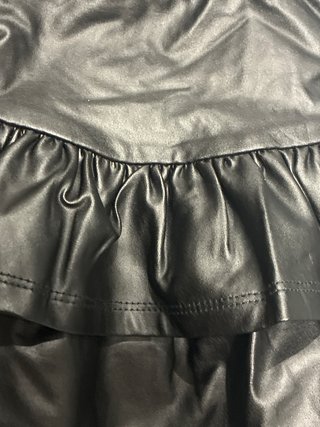 Mini falda negra con cinturón